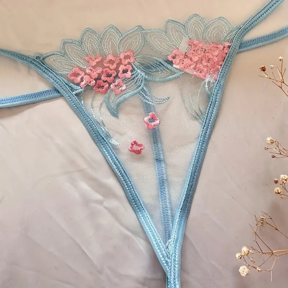 Conjunto de encaje Floral transparente.