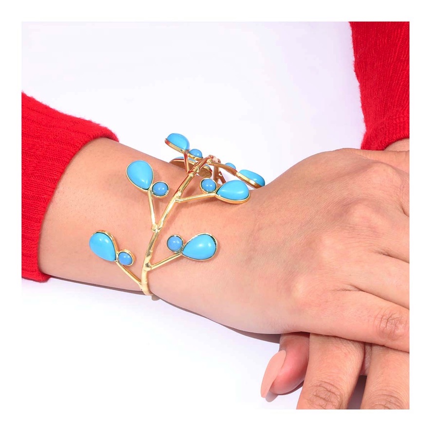 Brazalete con incrustaciones de piedras naturales (Color Turquesa) que imitan la belleza de ramas con hojas.