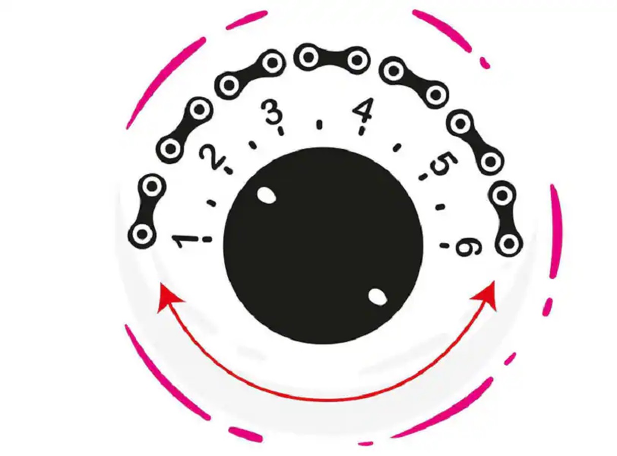 Tractor montable electrico con remolque verde.