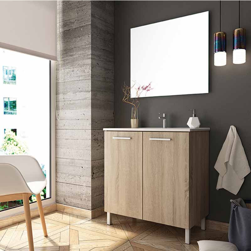 Set Mueble para baño a piso (Gabinete) MA60CA con dos puertas y entrepaño. El set incluye: lavabo de cerámica, espejo y monomando. Color Cambrian.