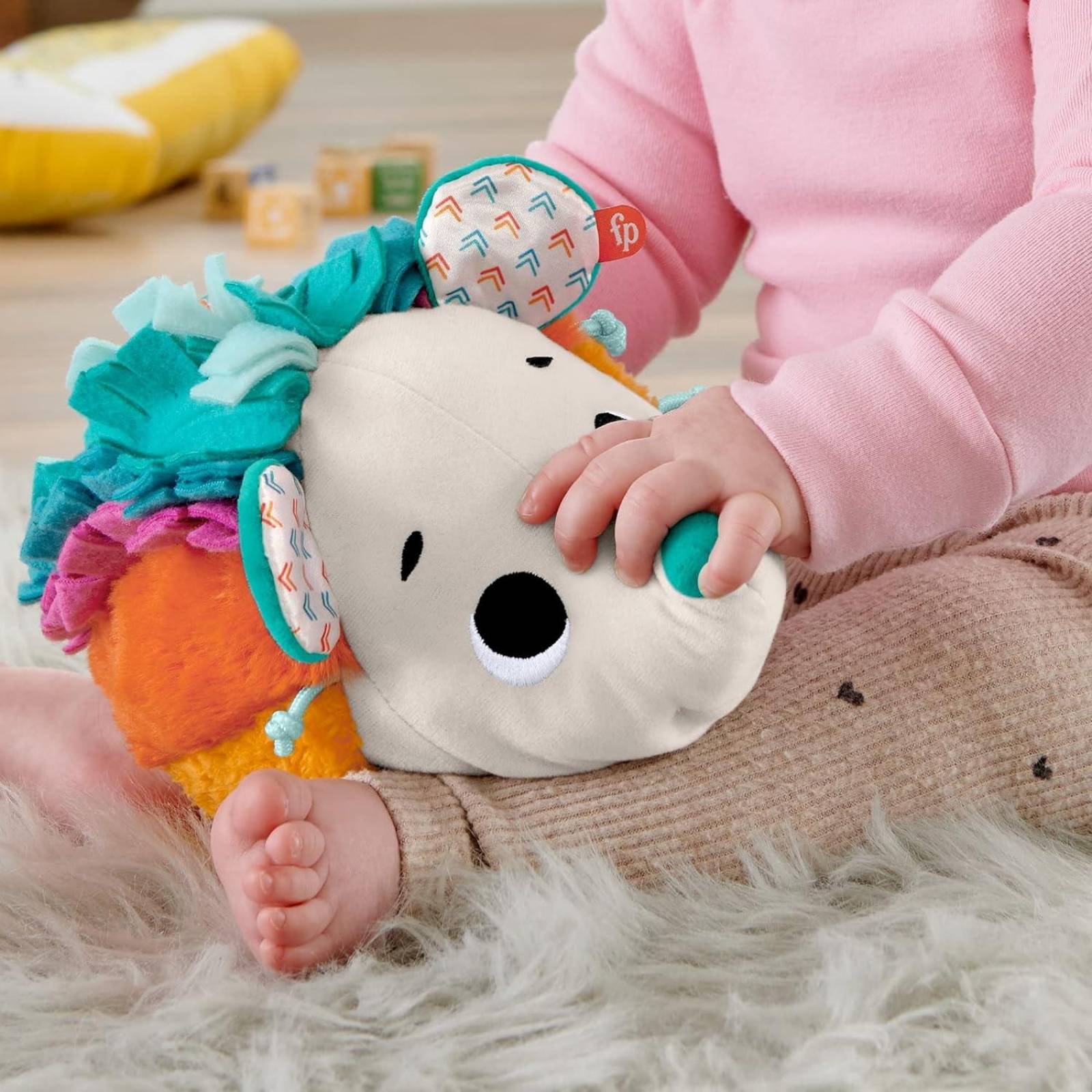 Fisher-Price Cuddle n' Snuggle - Peluche de Erizo con Sonidos y Texturas para bebés 