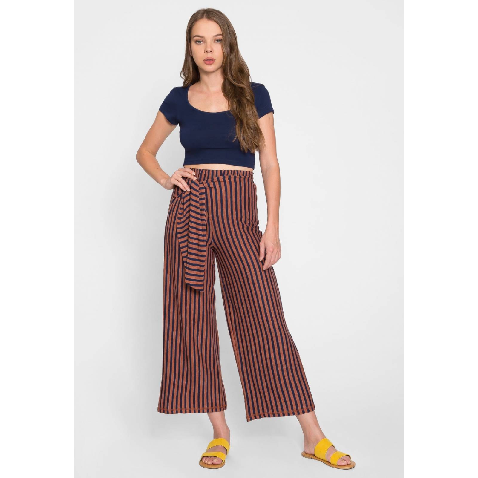 Pantalones rayados en naranja