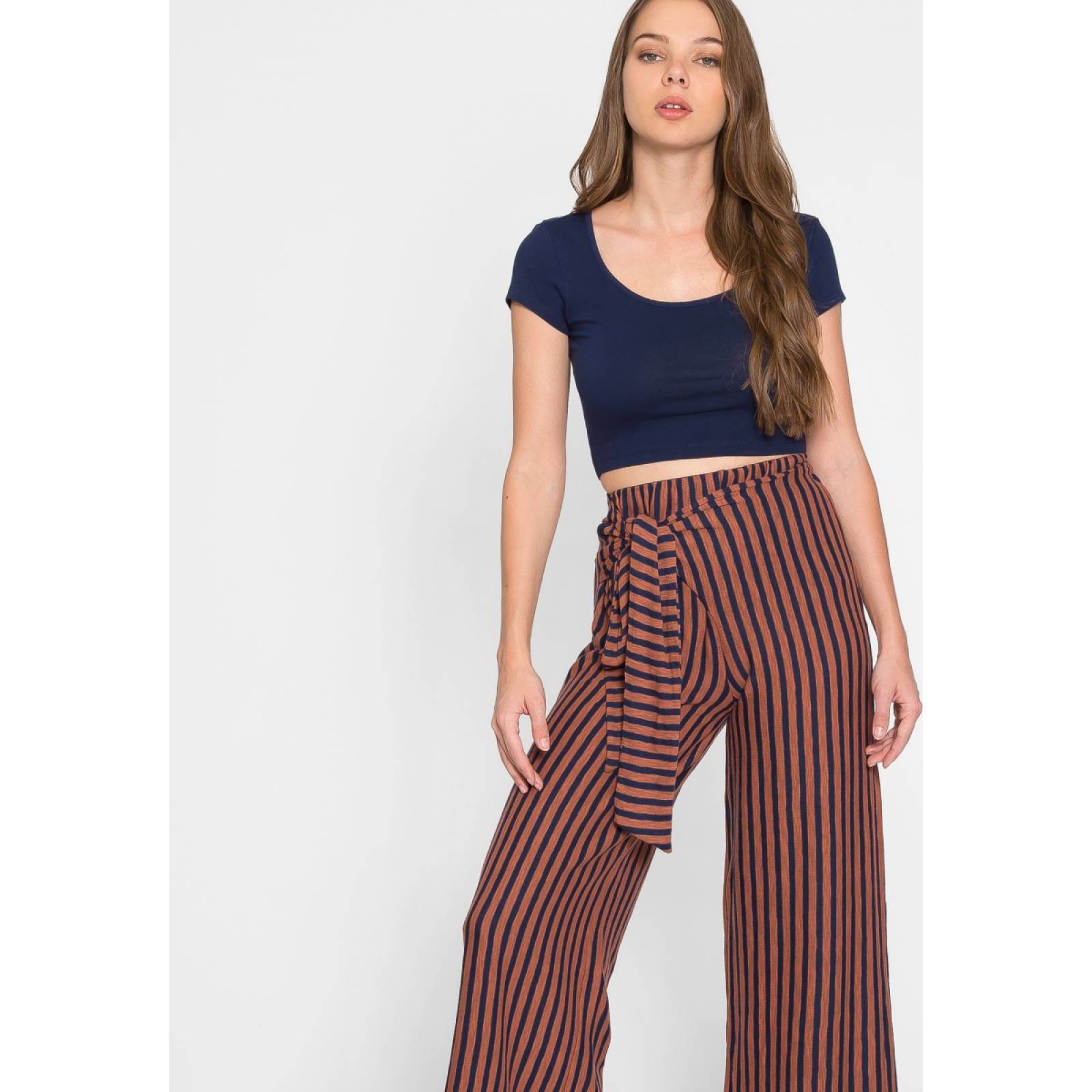 Pantalones rayados en naranja