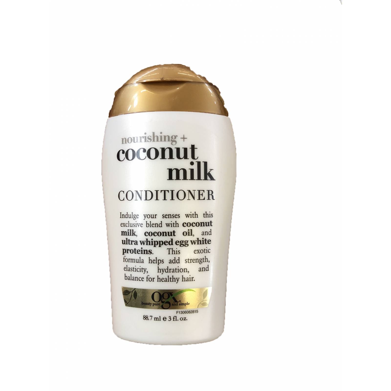 Acondicionador  liquido tamaño de viaje 88.7 ml Organix OGX Sin sulfatos y sin sales o parabenos - Leche de Coco