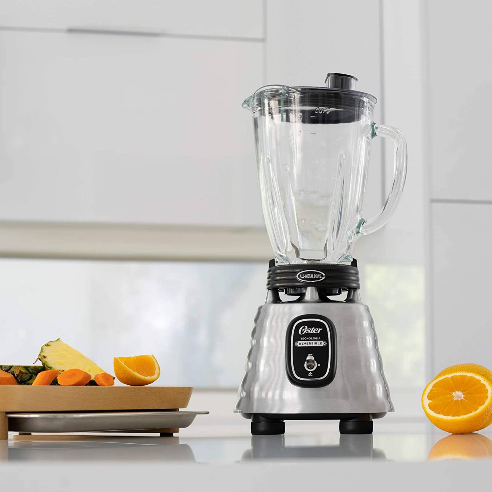 Licuadora 700w vaso vidrio motor reversible acero Inox (2114087) Marca Oster