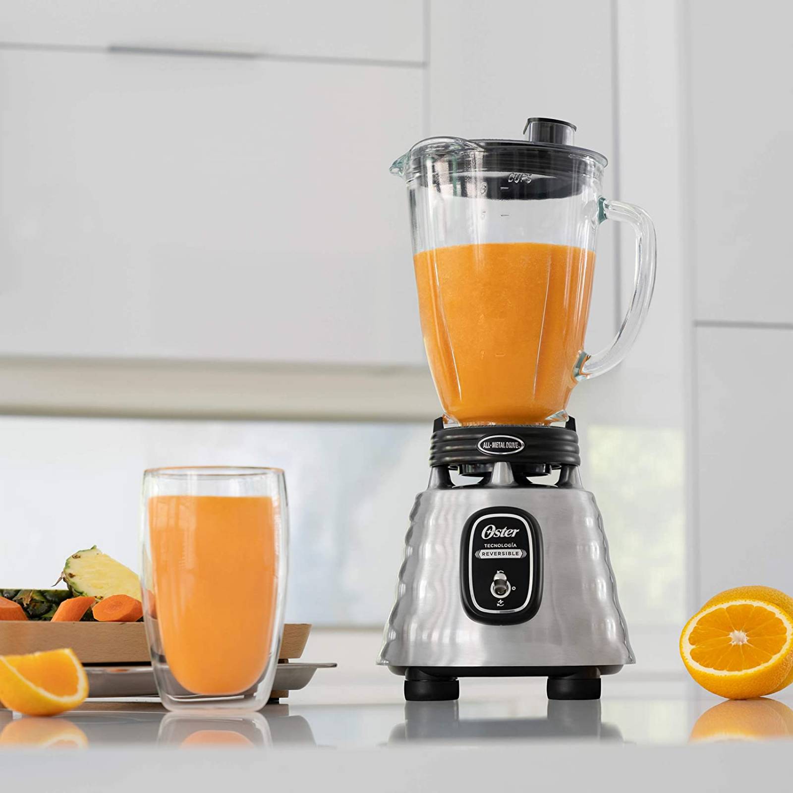 Licuadora 700w vaso vidrio motor reversible acero Inox (2114087) Marca Oster