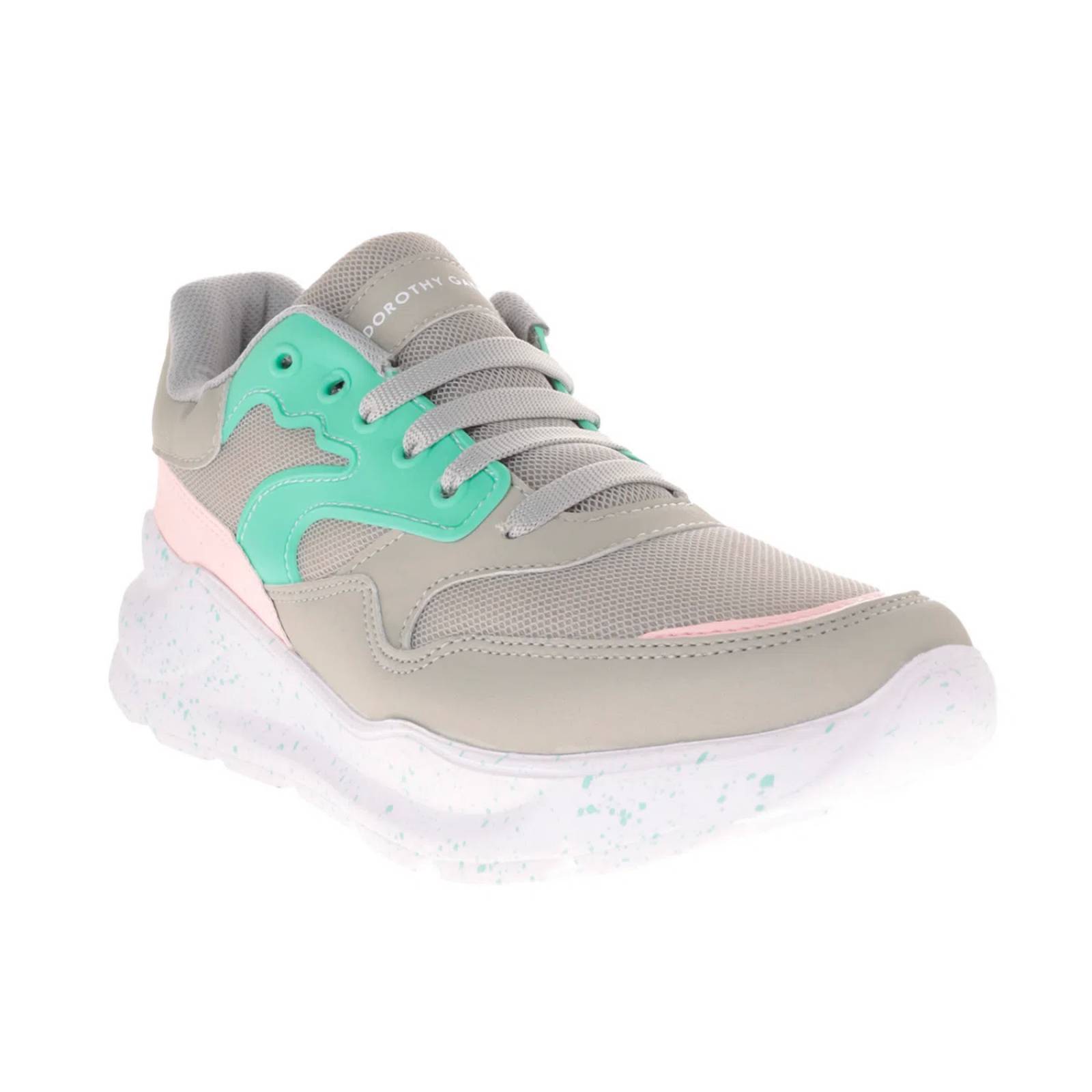 Tenis Rosalía color gris con detalle de color neon y textura en suela