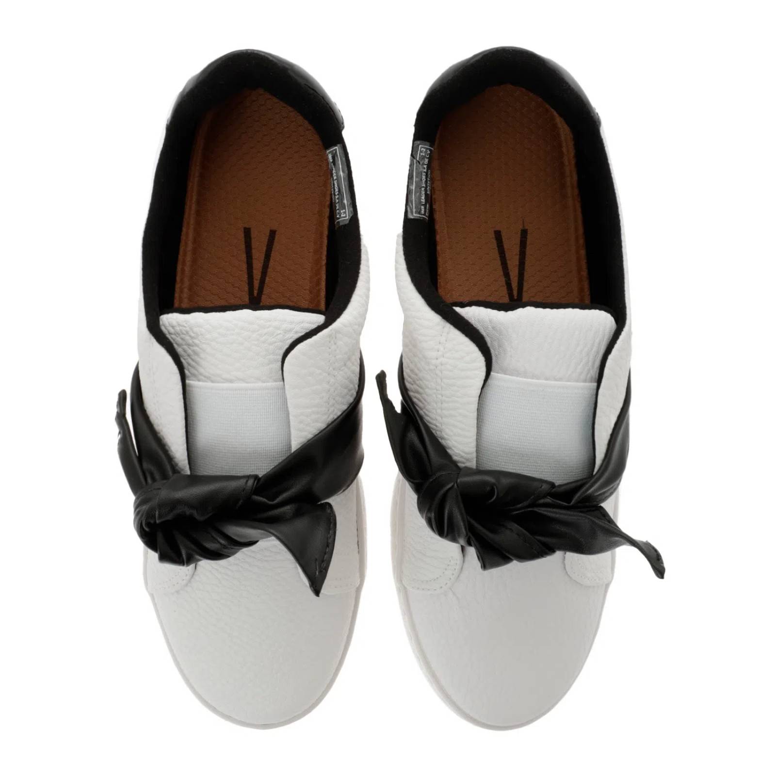 Tenis Auro color blanco con moño negro D14240091620