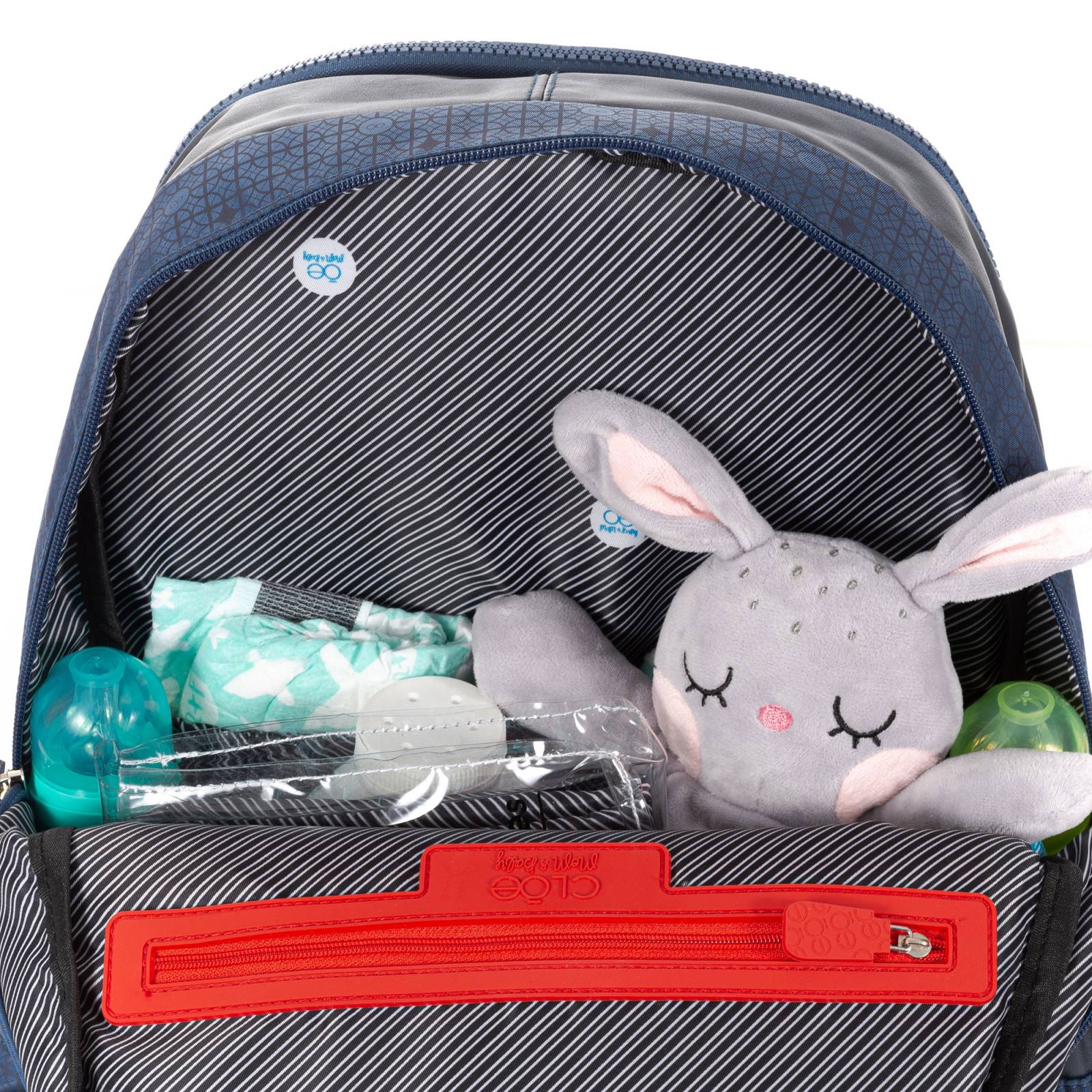 Pañalera backpack textil con trama icónica de la marca