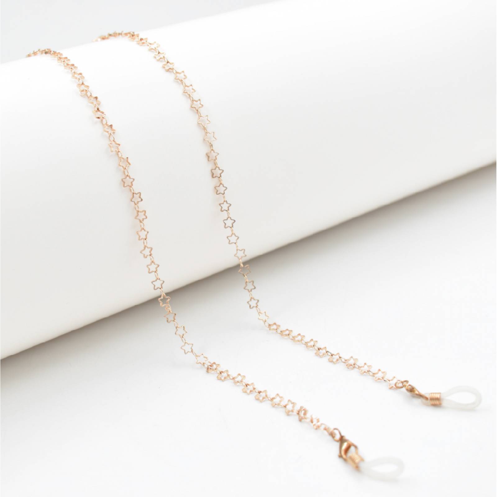 ADORN, Cadena para lentes y cubre bocas, color dorado diseño en estrellas a tono, mujer.