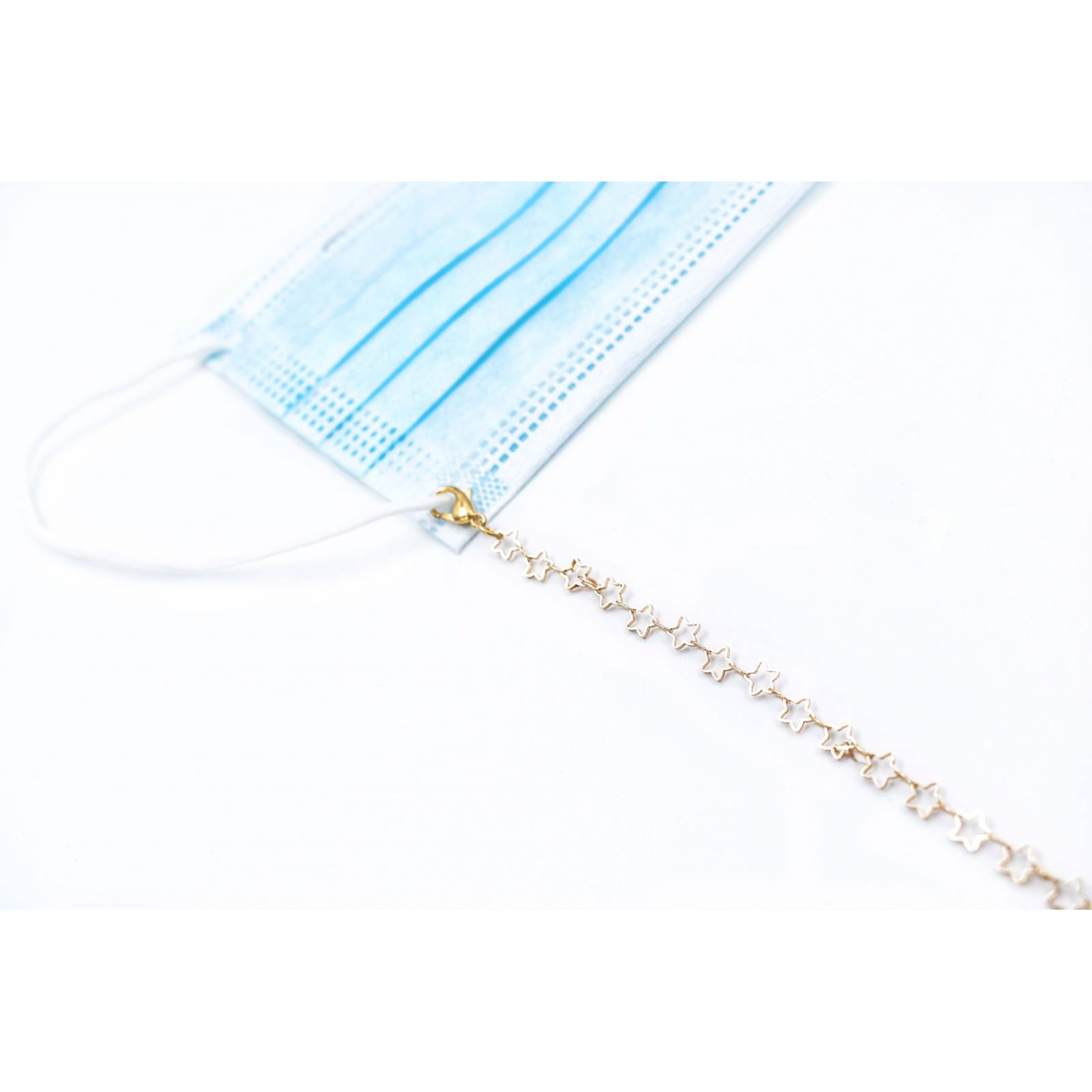 ADORN, Cadena para lentes y cubre bocas, color dorado diseño en estrellas a tono, mujer.