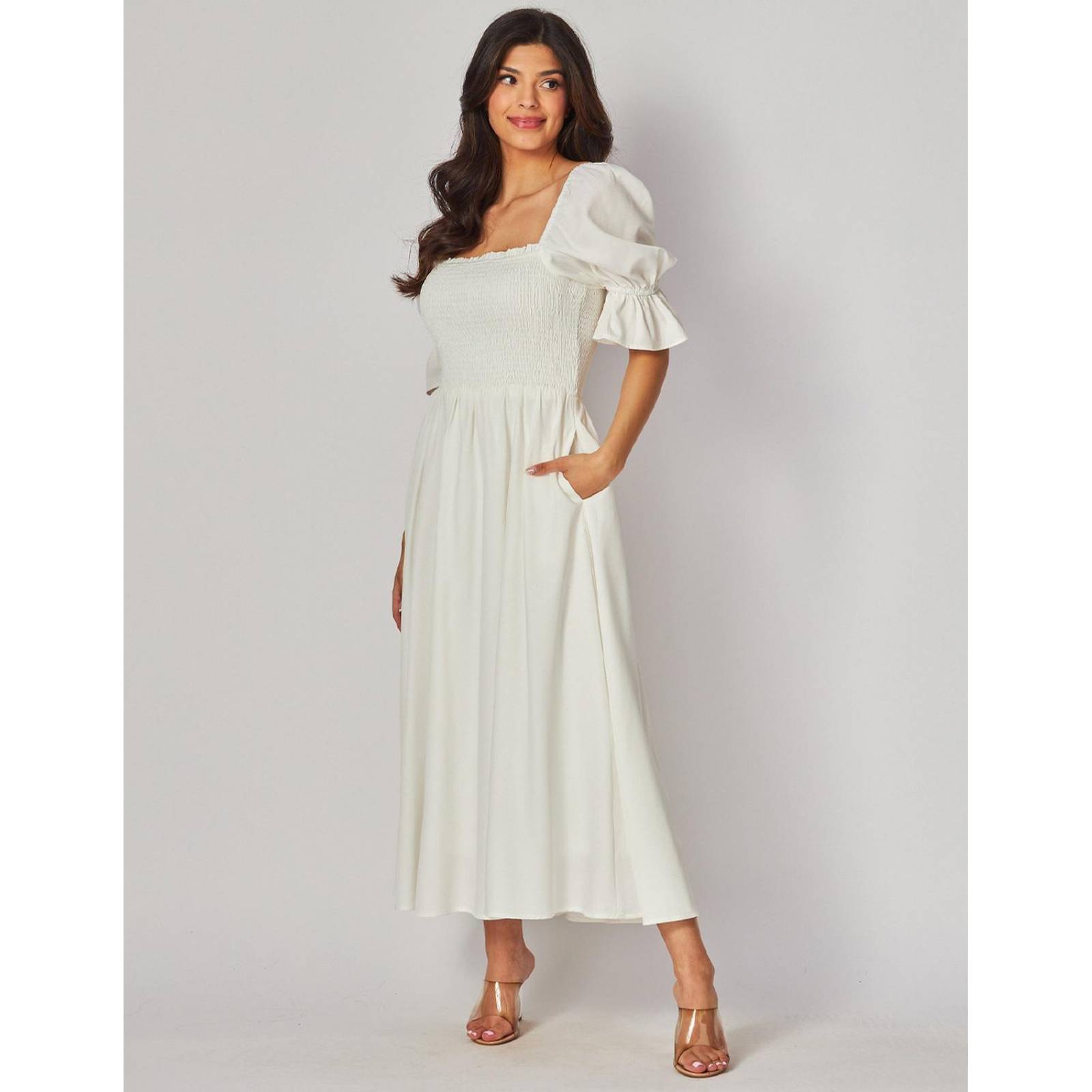 Vestido con elástico en el talle y manga bomba