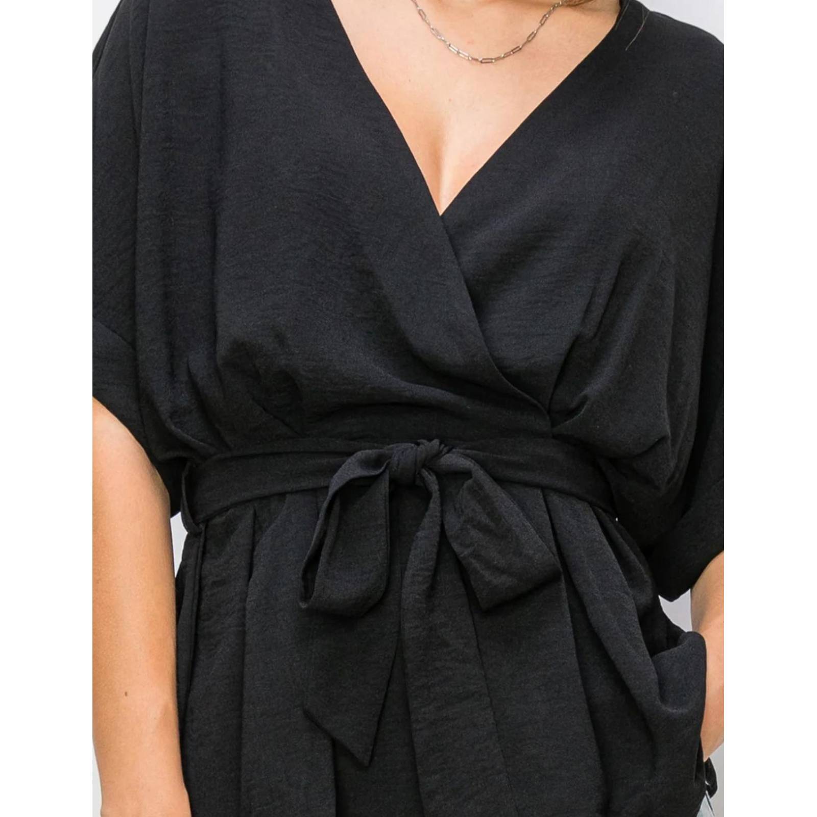 Blusa peplum con cinto 