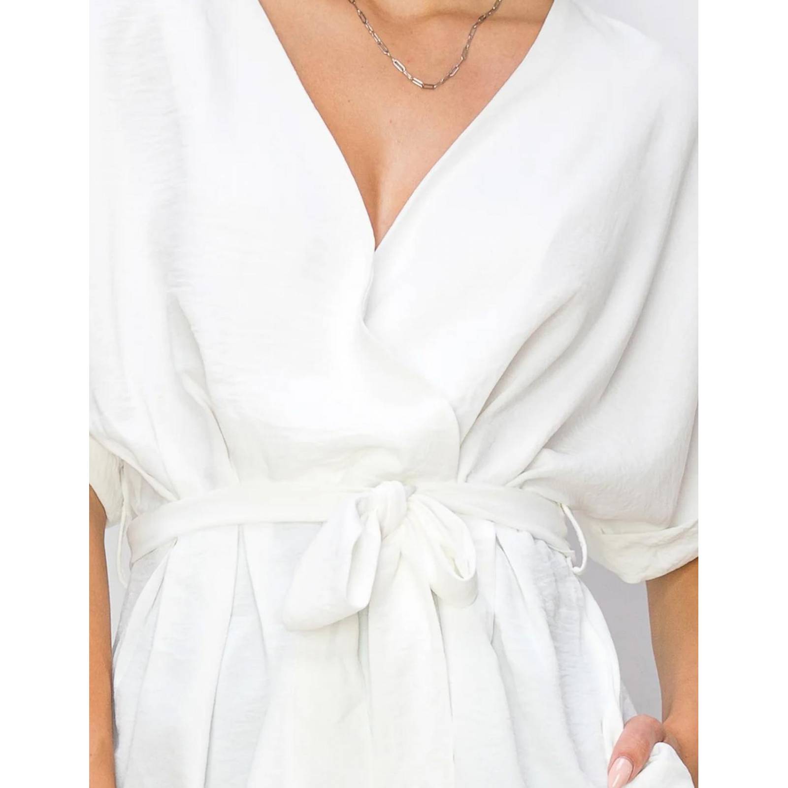 Blusa peplum con cinto 