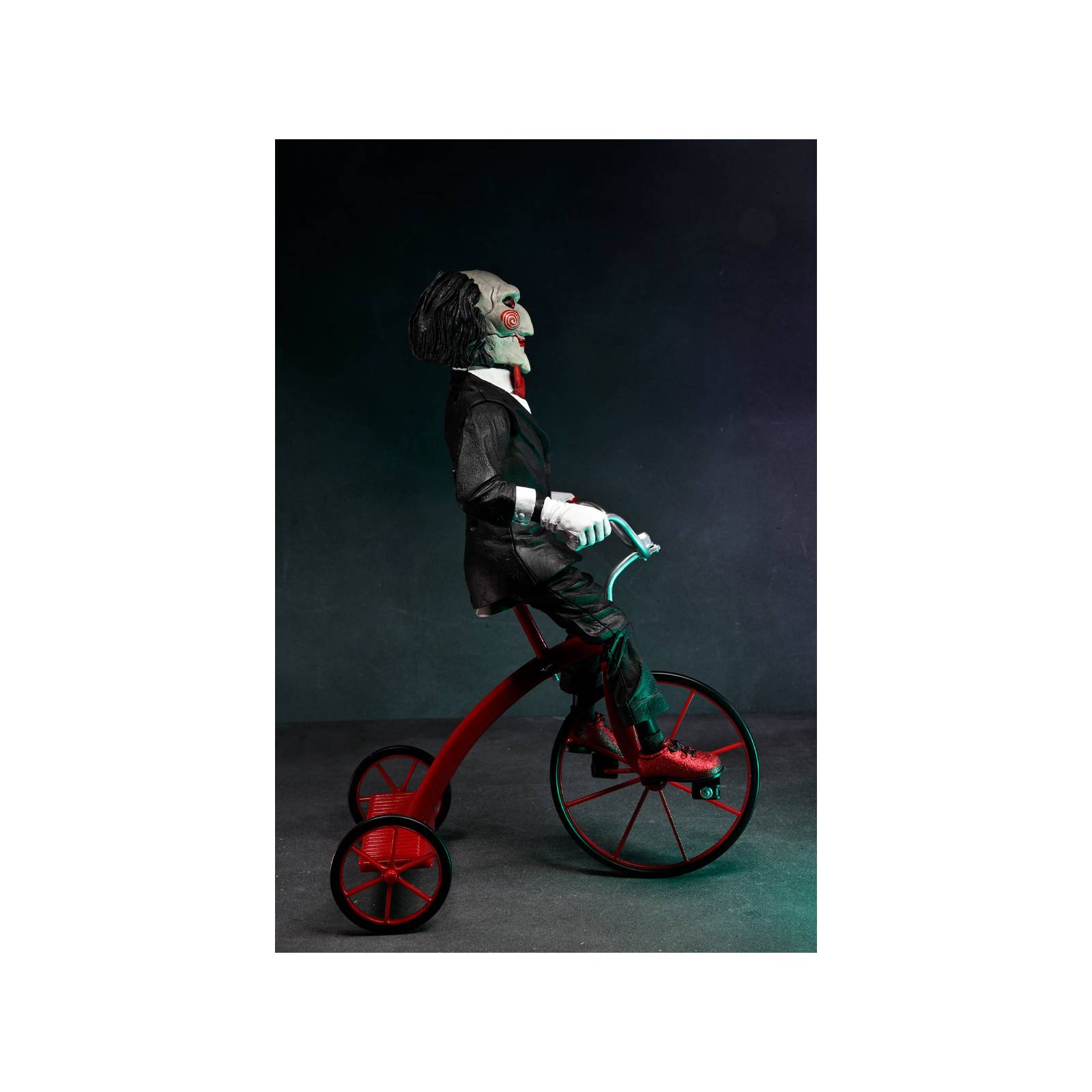 Figura Neca Saw - Billy en Triciclo con Sonido 12 Pulgadas