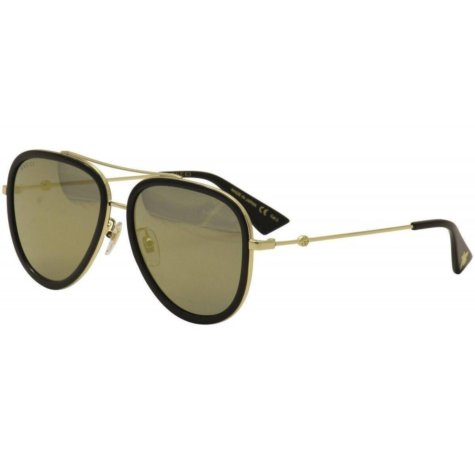 Gafas de sol Gucci masculina modelo aviador oversize de metal en tono  dorado.