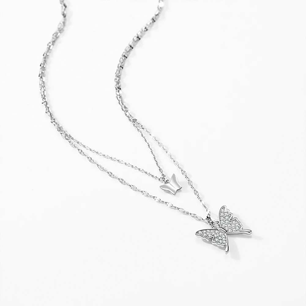 Collar doble con dijes de mariposa en Plata 925.