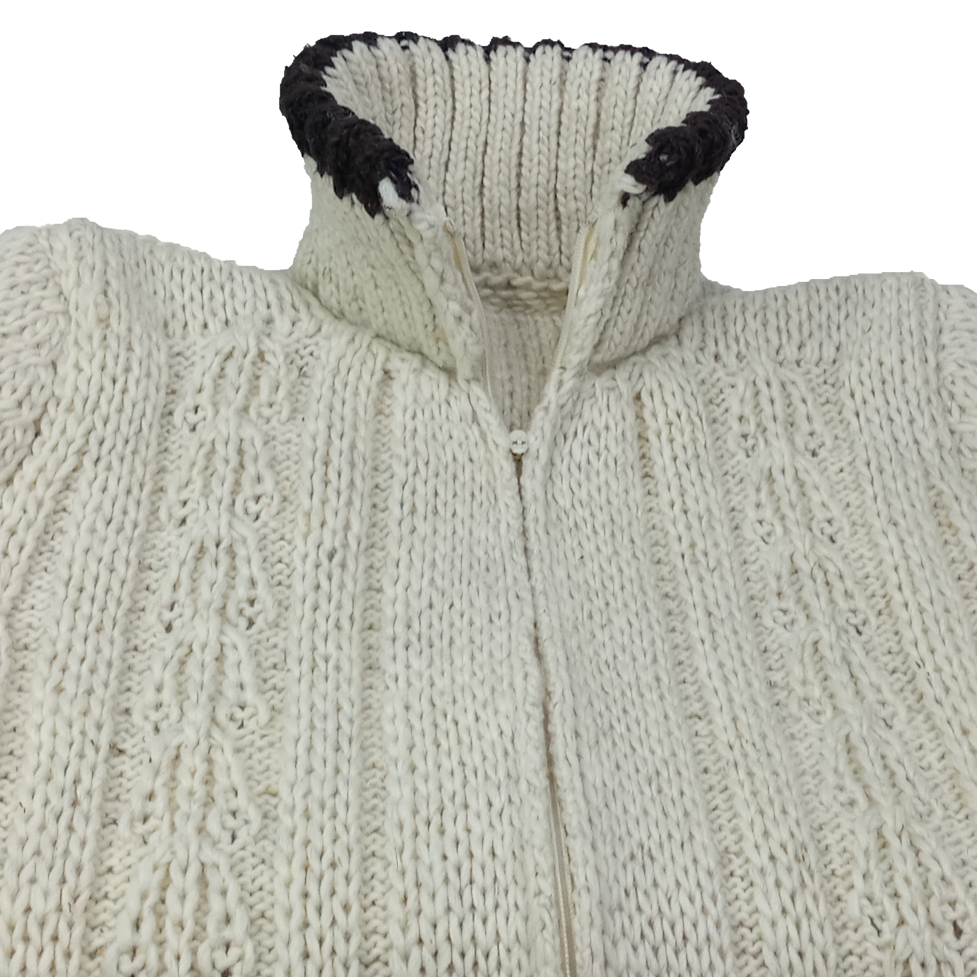 Suéter Chamarra de lana natural de oveja en color beige.