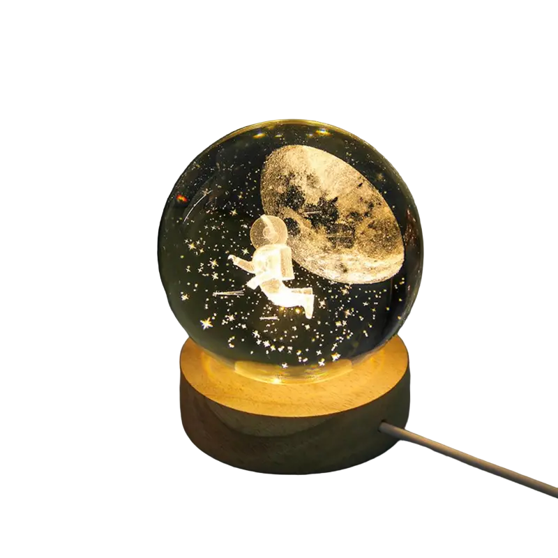 Lampara de mesa bola de cristal astronauta.