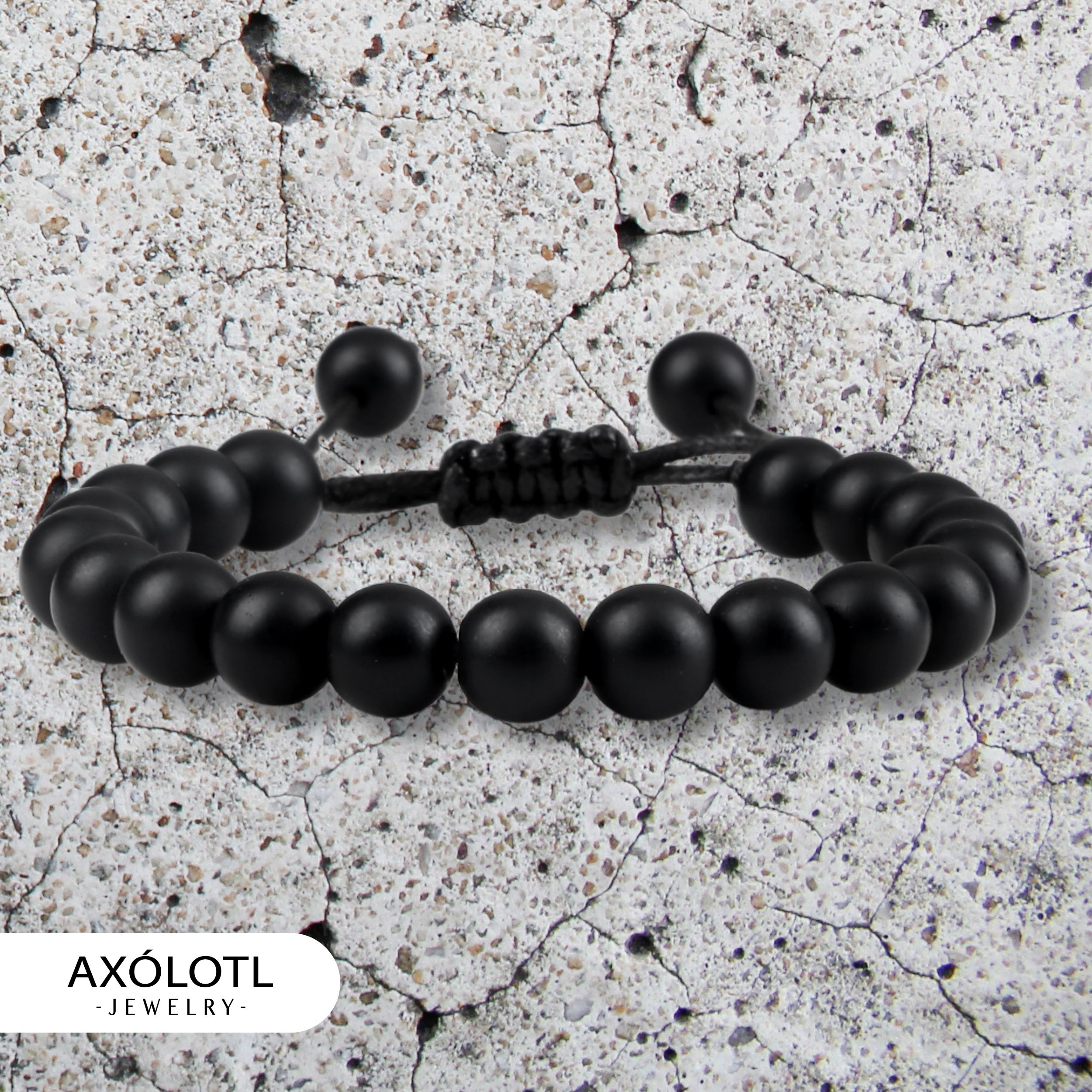 Elegante pulsera ajustable Axólotl Jewelry de piedra ónix para meditar, curativa y de protección.