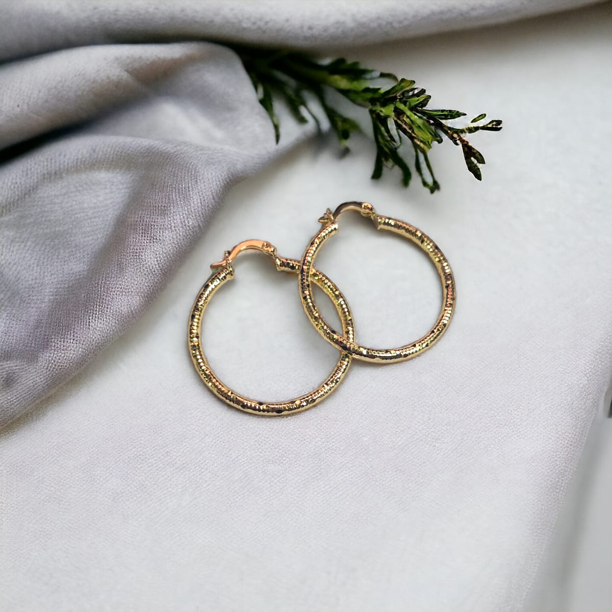 Arracada diamantada.