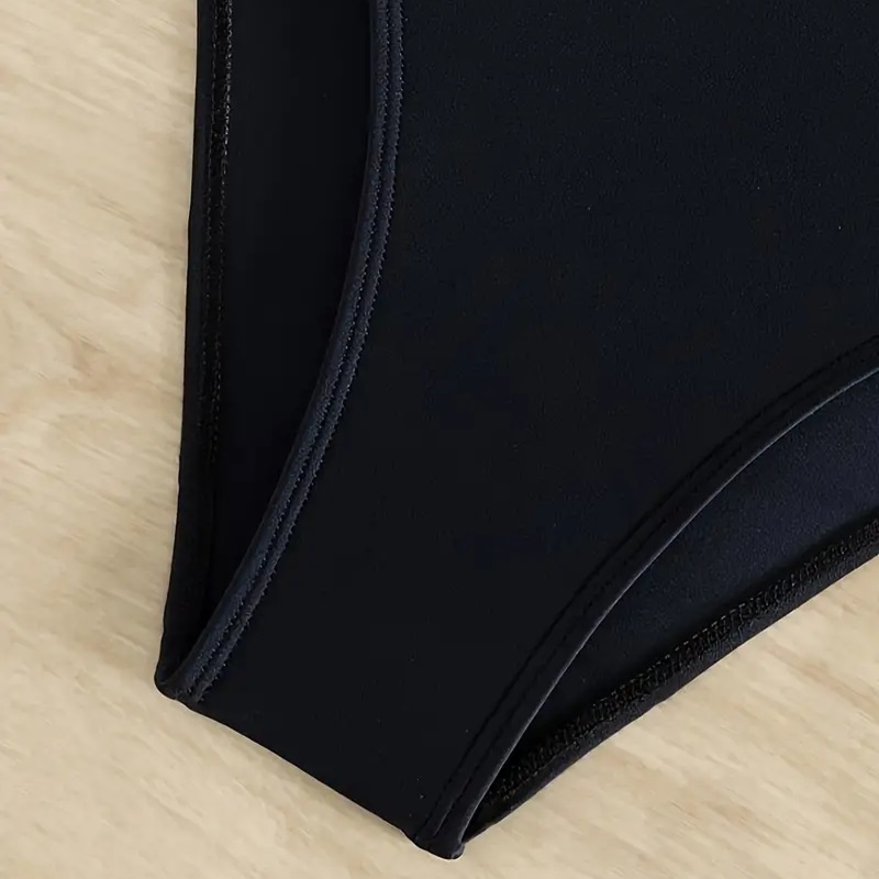 traje de baño Negro con Blanco talla L.