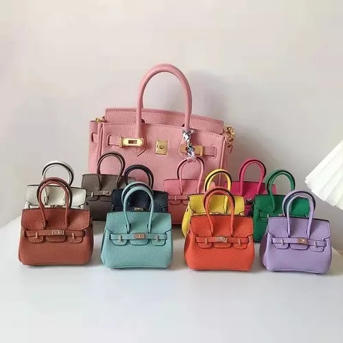 Funda  Negra Tipo Bolsa De Mujer Moda Protectora Compatible AirPods Generación 1 y 2.