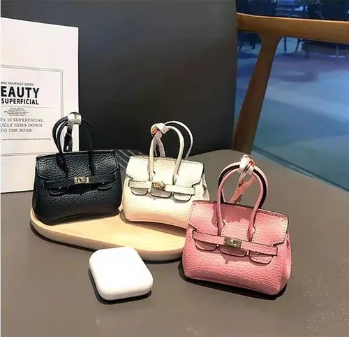 Funda  Negra Tipo Bolsa De Mujer Moda Protectora Compatible AirPods Generación 1 y 2.