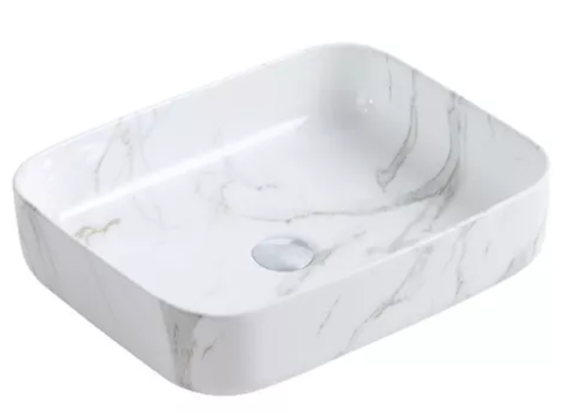 Lavabo Cerámico para Baño TIM, forma rectangular acabado blanco marmoleado. De sobreponer, con diseño europeo ideal para todo tipo de baños. Dimensiones 50.0 x 39.0 x 13.0 cms. (base x altura x profundidad)