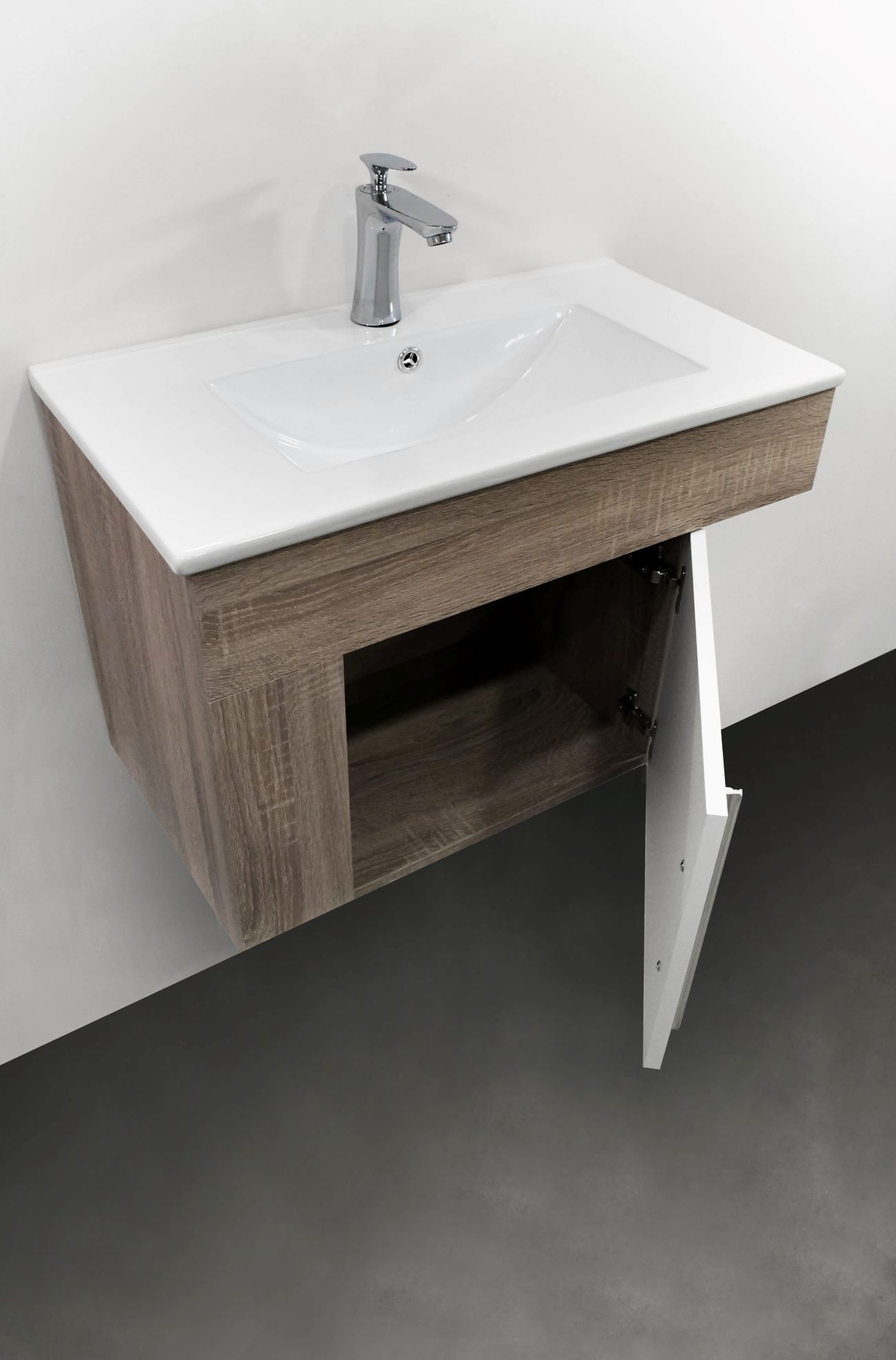 Set Mueble para baño suspendido (Gabinete) GR70CA de 70 cms. con una puerta.  El set incluye: lavabo de cerámica, espejo y monomando. Estructura color Cambrian y puerta blanca.