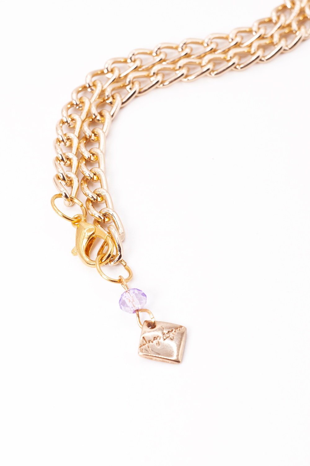 Collar largo artesanal A ÁNGELOZANO flores de barro rosa morado, pulsera y aretes.