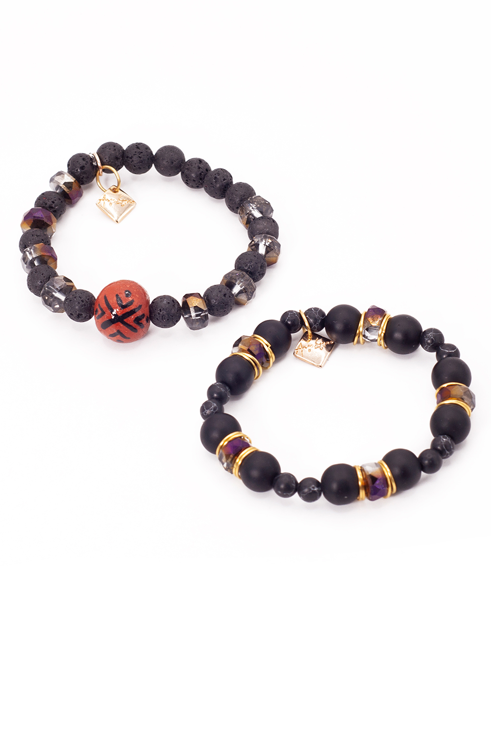 Juego artesanal rombos A ÁNGELOZANO, barro negro, pulsera y aretes.