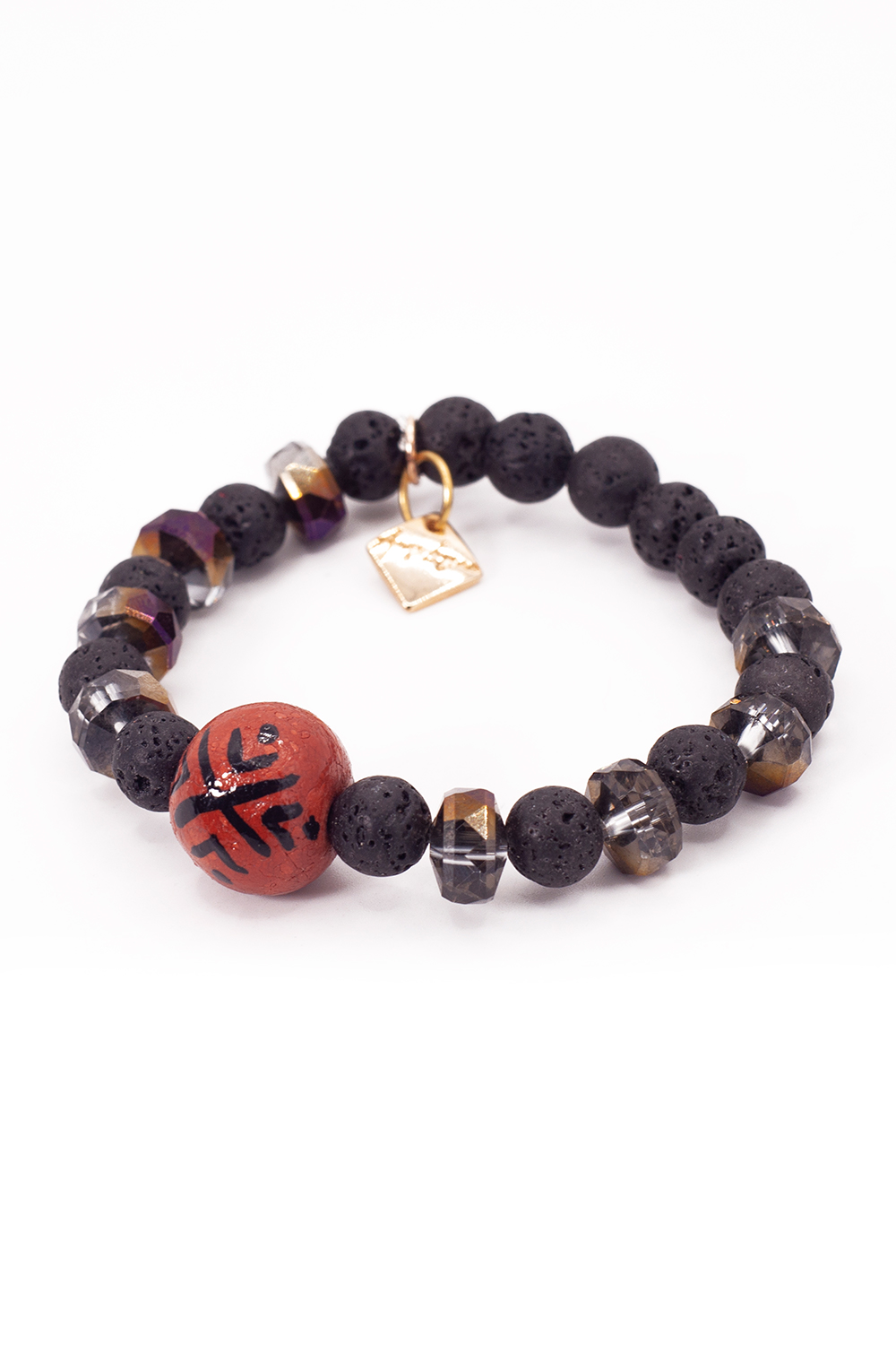 Juego artesanal rombos A ÁNGELOZANO, barro negro, pulsera y aretes.