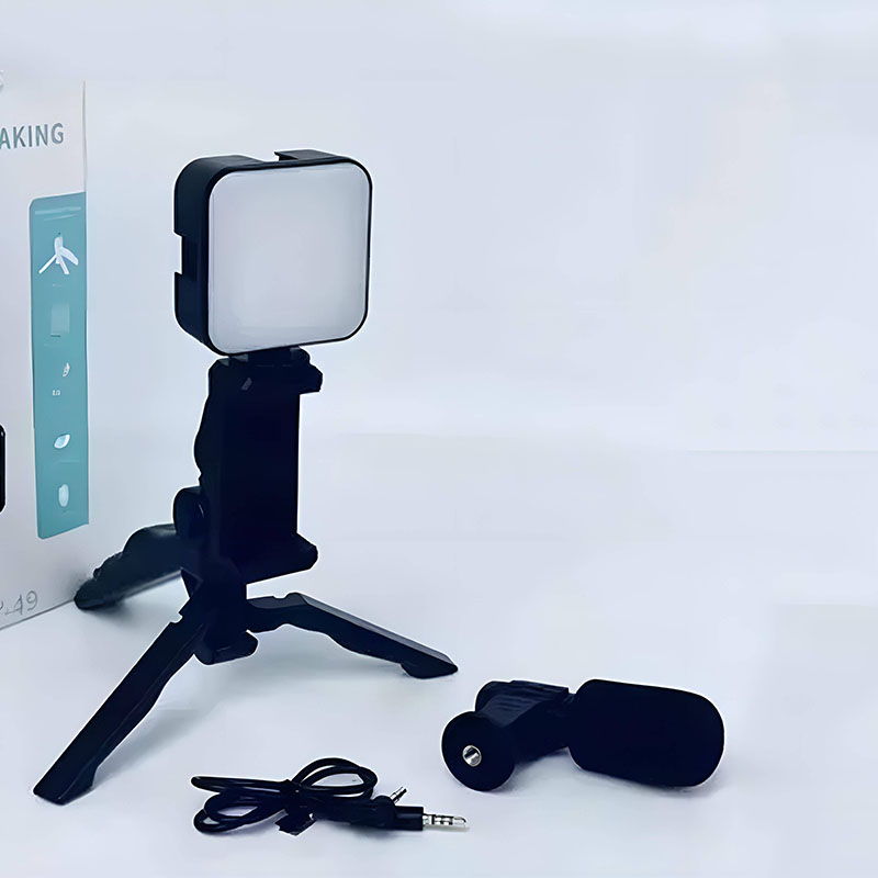 Soporte para celular 3 en 1, tripie, luz y micrófono.