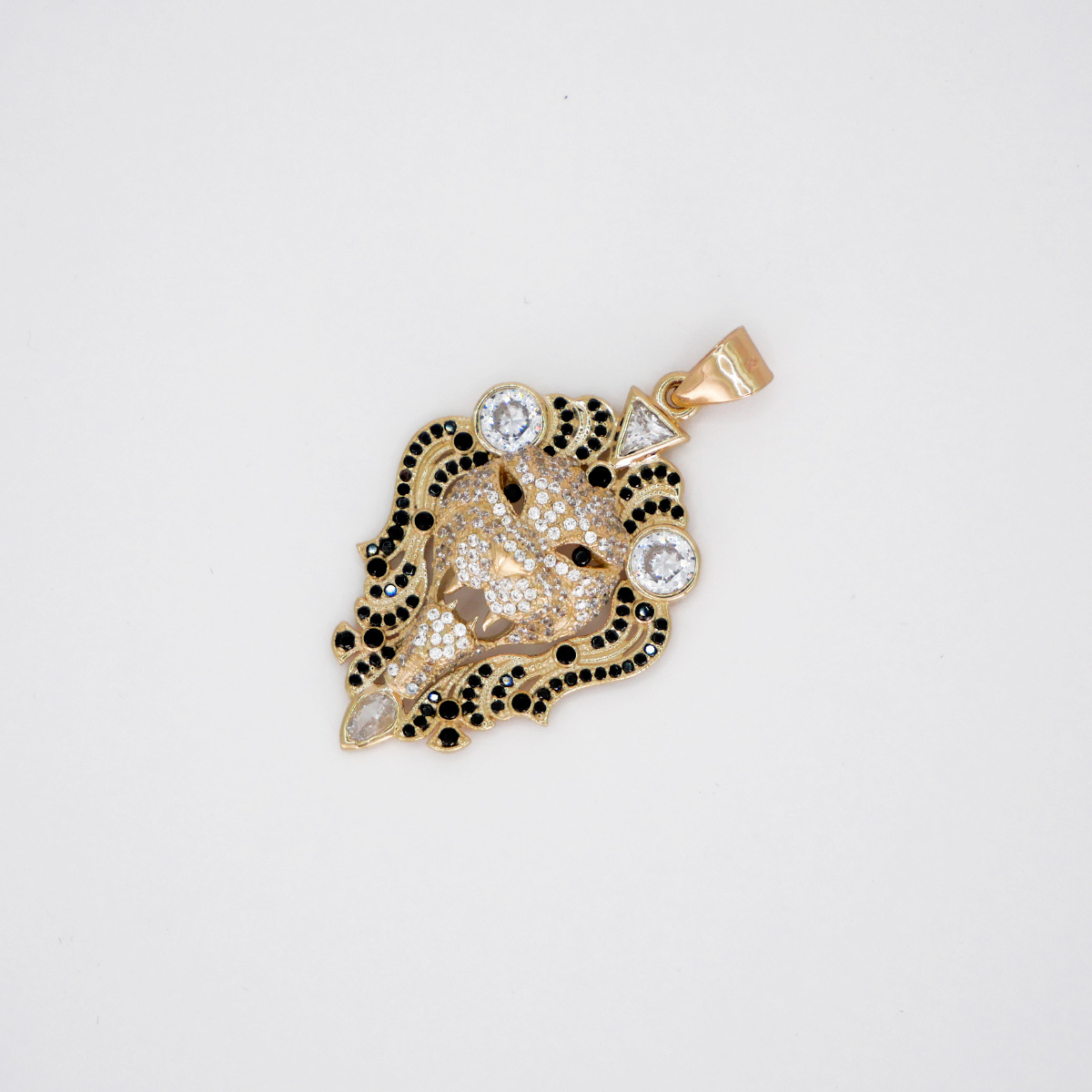 Dije León de Oro 10k con piedra zirconia