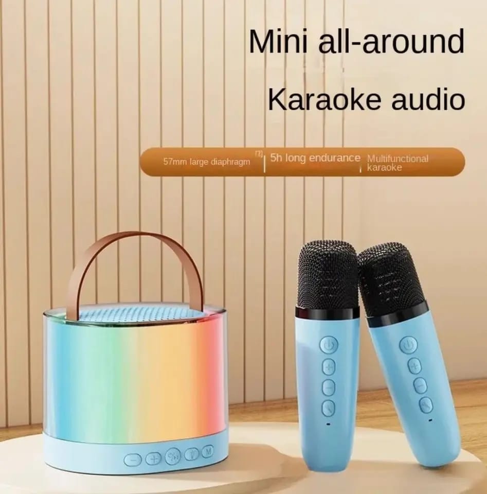 Mini bocina con dos microfonos karaoke con bluetooth.