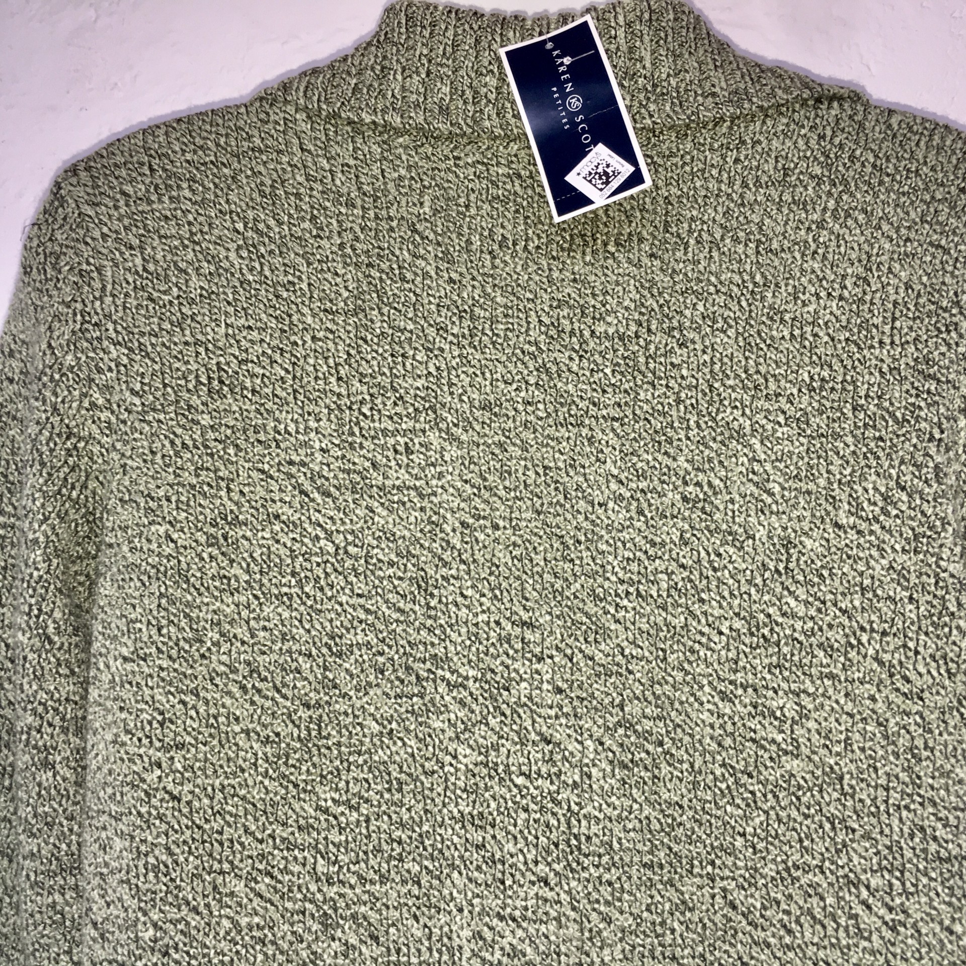 Cárdigan elegante en 6 botones talla S, bolsas al frente color verde de la marca Karen Scott.