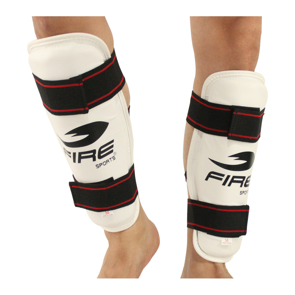 PAR DE ESPINILLERAS FIRE SPORTS PARA TAEKWONDO T-XG.