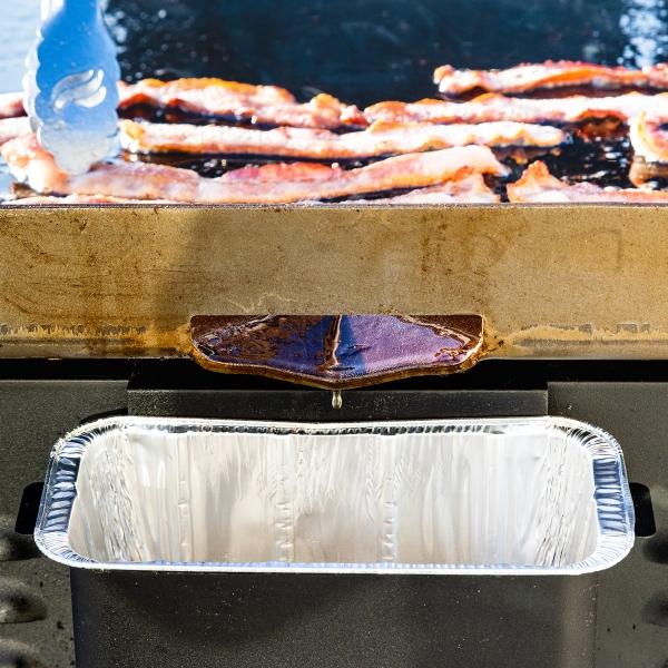 Recipiente trasero para depósito de grasa