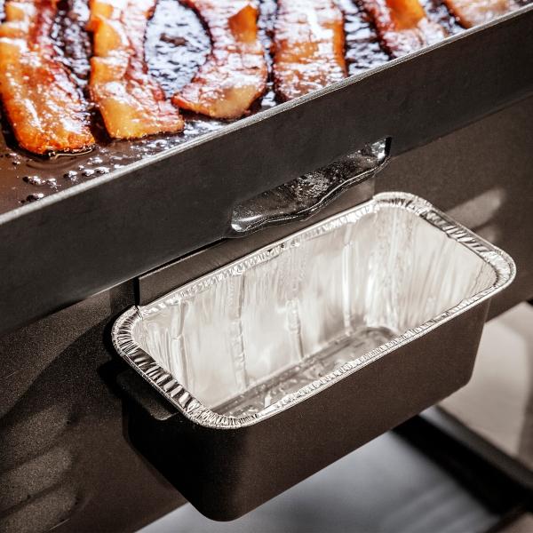 Recipiente trasero para depósito de grasa