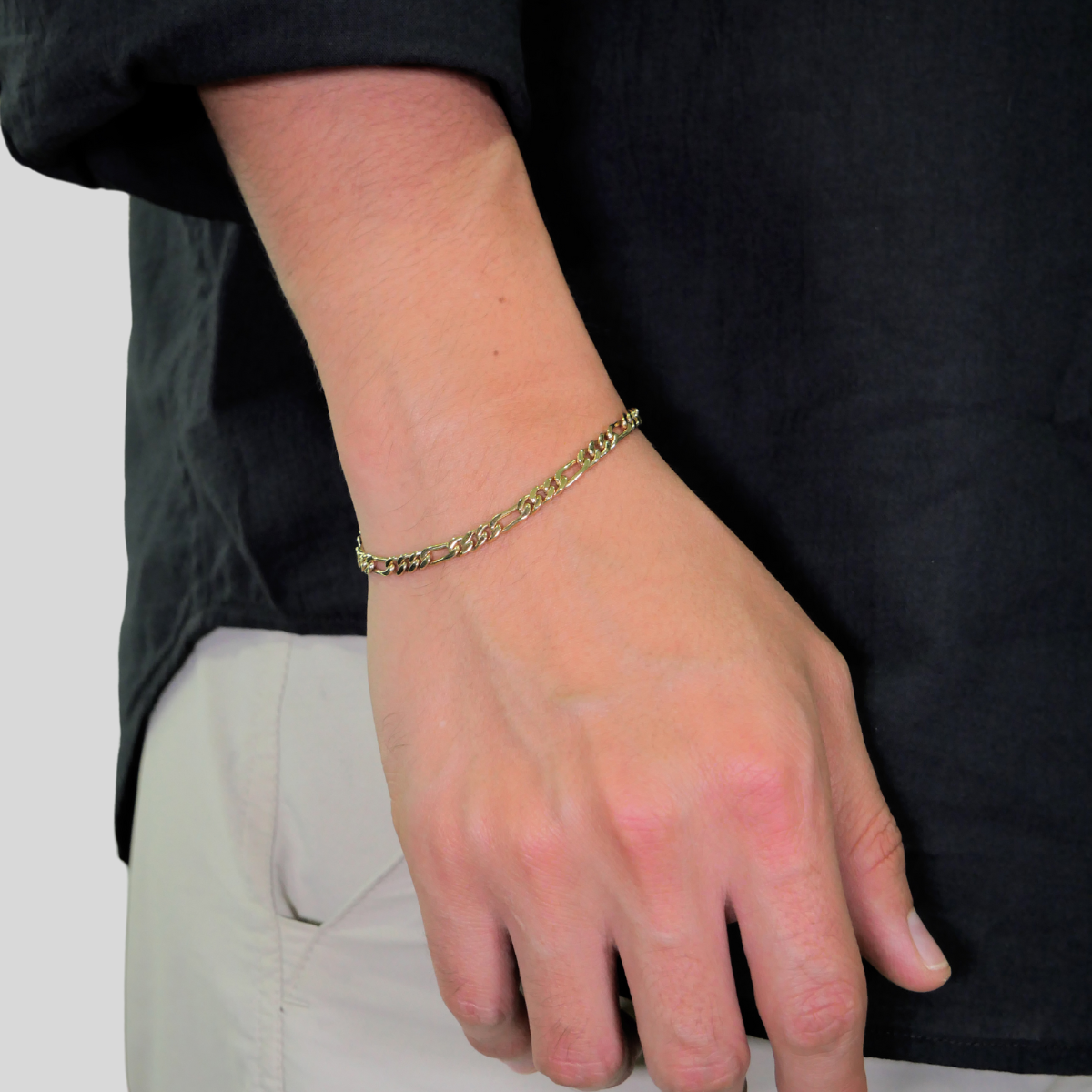 Pulso figaro de oro amarillo 10k para hombre con broche de caja.