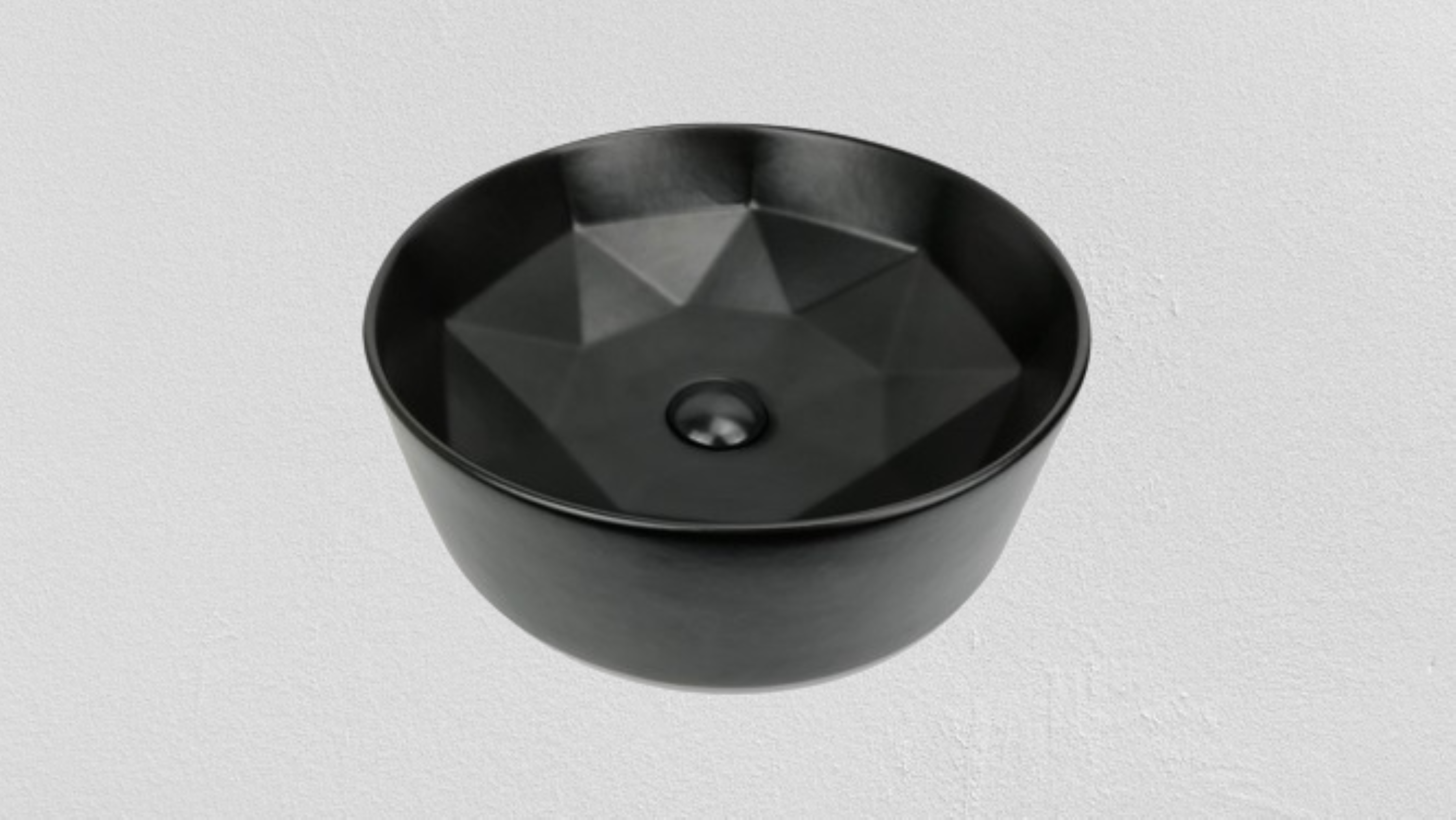 Lavabo Cerámico para Baño GHI, forma circular en color negro mate. De sobreponer, con diseño europeo ideal para todo tipo de baños. Dimensiones 40.5 x 40.5 x 14.5 cms. (base x altura x profundidad)